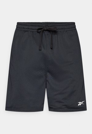 Black athletic shorts made of mesh fabric. Features an elastic waistband with a adjustable drawstring and a Reebok logo on the lower left.