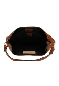 Borsa in pelle color tan con zip nella parte superiore e interno nero. Contiene un etichetta rettangolare all'interno e una lunga tracolla regolabile.