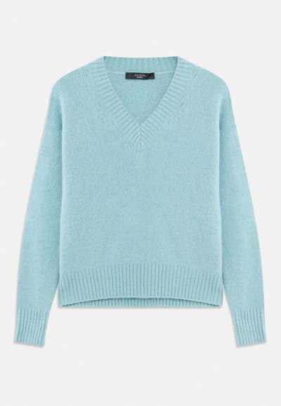 Light blue v-neck sweater made of soft, textured fabric. Features ribbed cuffs and hem, with a relaxed fit and minimal stitching details.