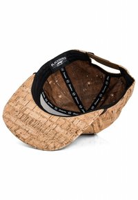 Cork baseball cap with a brown inner lining, curved visor, and adjustable strap. Features logo details and a textured surface.