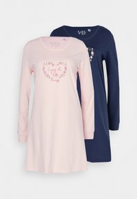 Two long-sleeve night dresses: one light pink with a floral heart design and text, and one dark navy with a similar floral accent.