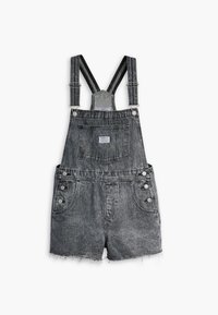 Graue Denim-Latzshorts mit verstellbaren Trägern, Fronttasche, Knopfakzenten und fransigem Saum. Hergestellt aus einem strukturierten Stoff.