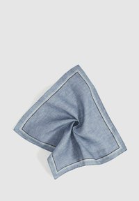 Blue cotton handkerchief with a white border. Square shape, light texture, and a subtle woven pattern. Folded in a triangular form.