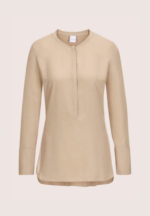 Beige Bluse mit langen Ärmeln, Stehkragen und versteckter Knopfleiste, mit abgerundetem Saum und breiten Manschetten.