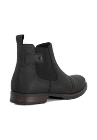 Black leather ankle boot with elastic side panels and a back tab. Round toe, slightly curved heel, and textured sole for traction.