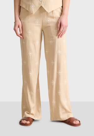 TORINO - Trousers - beige