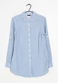 Blå och vit rutig långärmad skjorta, av bomull, knäppt framtill, klassisk krage, rundad nederkant och uppvikta ärmar med knäppningar.