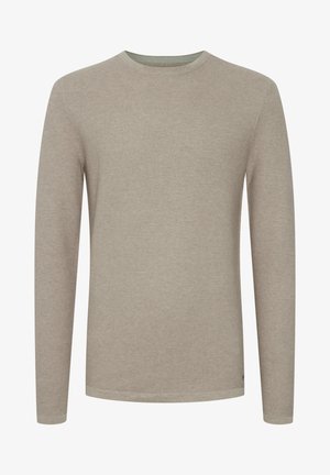 Beige pikad varrukad särk, millel on tekstureeritud kudumise disain, ümmargune kaelus ja kontrastne sisetihend koos peenete aktsentidega.