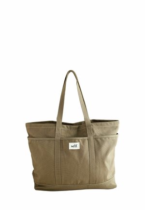 Canvas tote taske i olivengrøn med to solide håndtag, syede sømme og et signaturmærke på forsiden. Rummelig indre design.