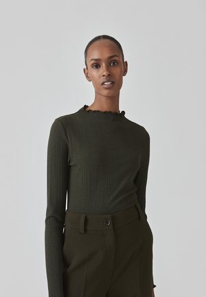 Dark green ribbed long-sleeve top with a ruffled neck detail, paired with matching high-waisted pants featuring a button closure.