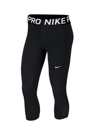 Leggings courts noirs Nike Pro avec logo blanc sur la cuisse et large ceinture présentant le texte blanc "NIKE PRO".