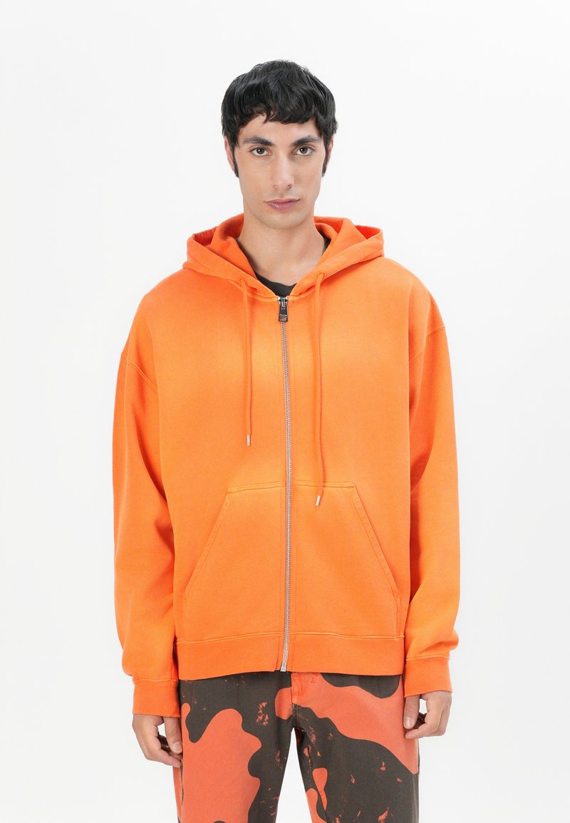 Études Sweater met rits oranje