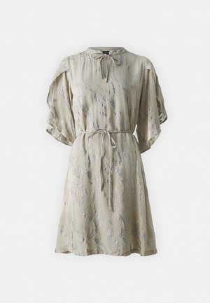 Light beige dress with a shimmering silver pattern, short puff sleeves, a tie at the neckline, and a drawstring waist for adjustable fit.