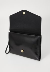 Black faux leather clutch bag with a smooth texture, magnetic snap closure, and a detachable wrist strap. Interior features a plain fabric lining.