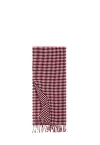 Woven scarf in maroon and pink houndstooth pattern, featuring fringe edges, soft texture, and rectangular shape.