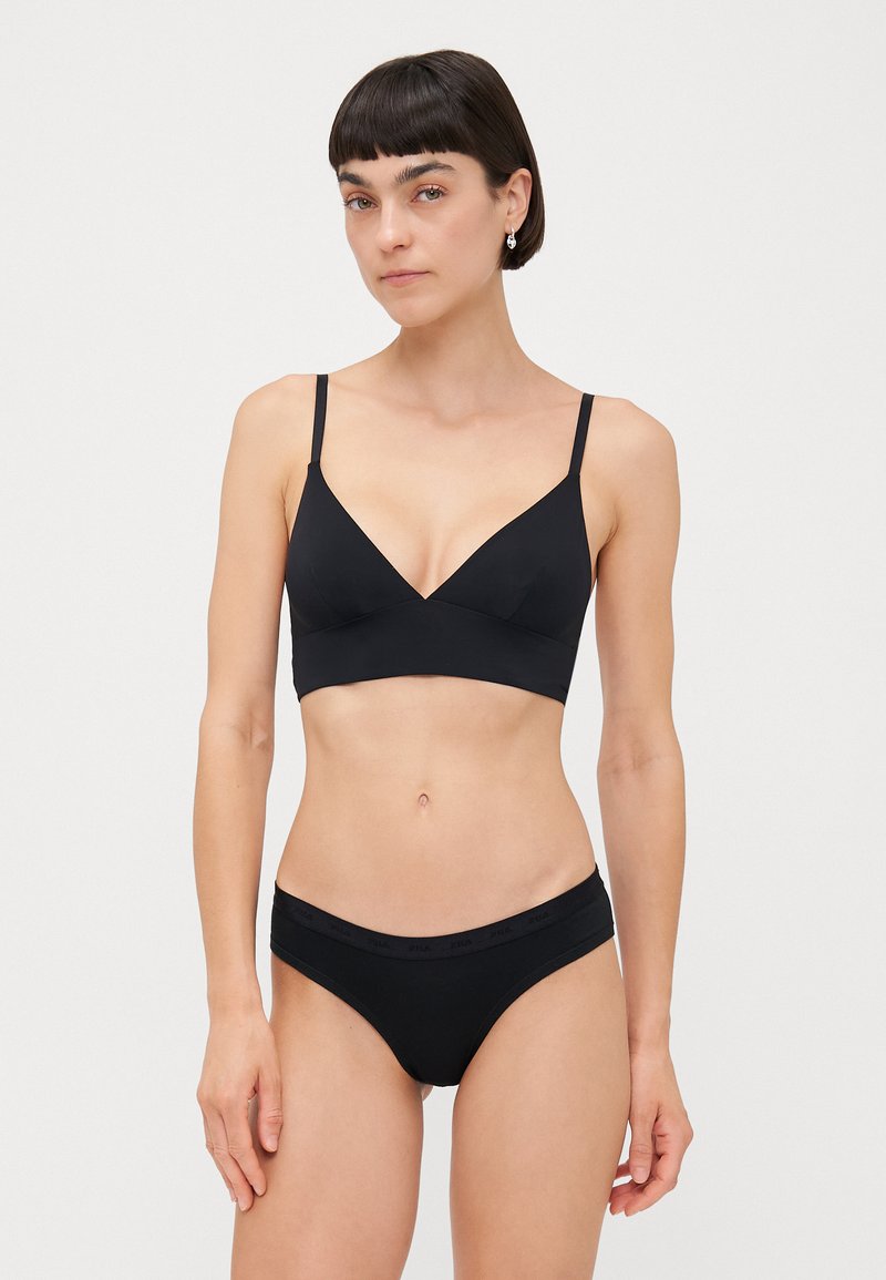 Black bralette with thin straps and a V-neck design, paired with black bikini briefs featuring a soft waistband. Smooth texture overall.