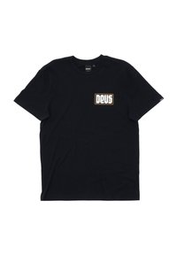 Black cotton t-shirt featuring short sleeves and a crew neck. Graphic text in white and orange reads "DEUS" on the left chest area.
