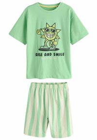 Zelený bavlněný pyžamový set obsahující tričko s krátkým rukávem s grafikou slunce a textem "Rise and Smile", doplněný pruhovanými šortkami.