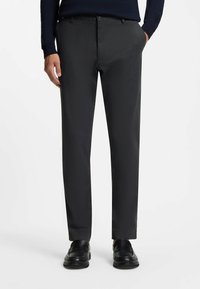 Charcoal gray tailored trousers, made from smooth fabric with a fine vertical pattern, featuring a button closure and side pockets.