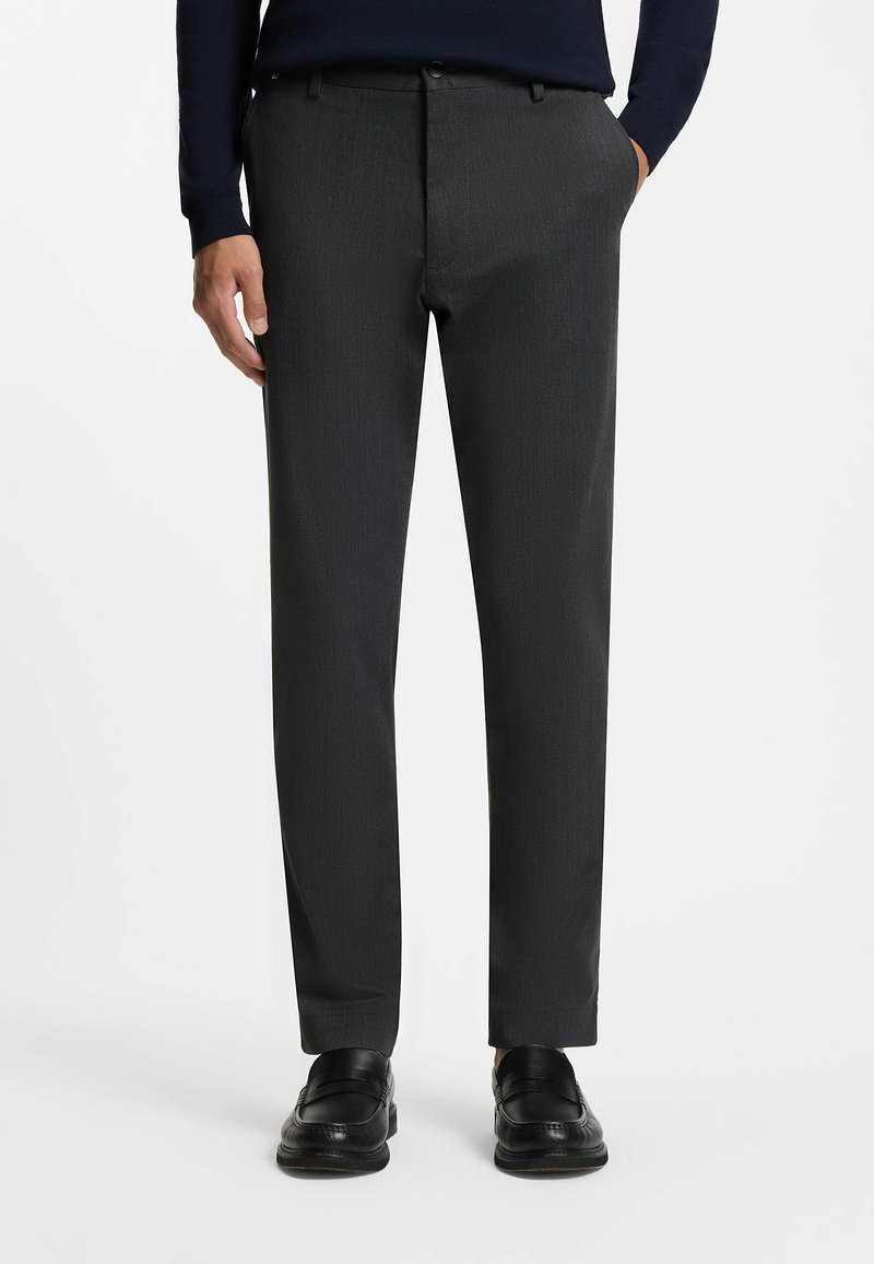 Charcoal gray tailored trousers, made from smooth fabric with a fine vertical pattern, featuring a button closure and side pockets.