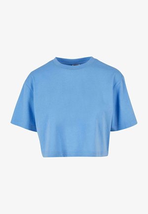 Camiseta corta azul hecha de algodón suave, con cuello redondo, mangas cortas y un diseño simple sin patrones ni acentos.