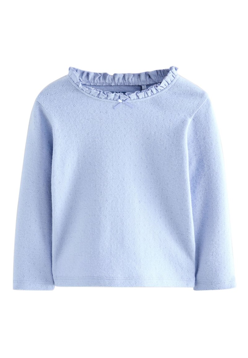 Hellblaues langärmeliges Oberteil aus strukturiertem Stoff, mit einem gerafften Ausschnitt und einer kleinen Schleifenverzierung vorne.