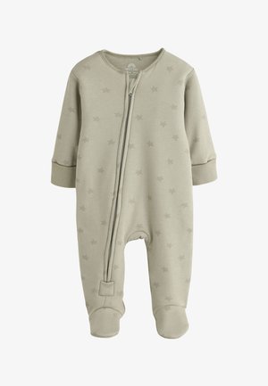 Pelele de bebé suave beige con mangas largas, cubre pies, patrón sutil de estrellas y una cremallera frontal que va desde el cuello hasta la pierna.