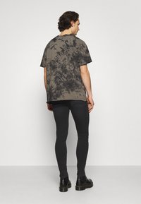 11 DEGREES Calças de ganga de corte skinny - washed black