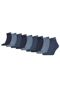 Zehn Paar Knöchelsocken in verschiedenen Blautönen und Marineblau; umfasst sowohl einfarbige als auch melierte Texturen mit einem Logo am Bund.