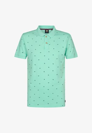 Tricou polo mint deschis din țesătură moale, cu guler, pantă cu trei nasturi și modele întunecate albastre împrăștiate pe toată suprafața.