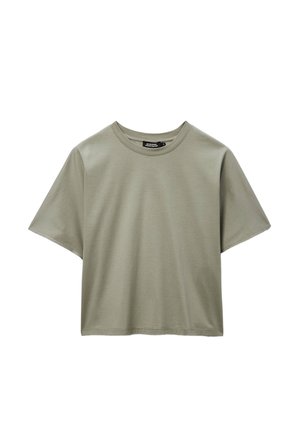 T-shirt en coton vert olive clair à manches courtes et col rond, coupe ample, présenté sur un fond blanc.