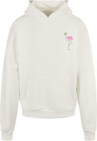 Hvid hættetrøje lavet af blødt stof, med et pink flamingo-tryk på venstre bryst og en frontlomme til opbevaring.
