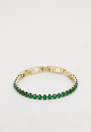 Bracciale in oro con gemme ovali verdi impostate in un design a catena. Texture liscia con meccanismo di chiusura.