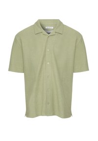 Hellgrünes Poloshirt mit kurzen Ärmeln aus strukturiertem Gewebe, mit einer Knopfleiste und einem klassischen Kragen. Entspannt geschnittenes Design.