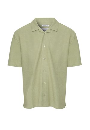 Hellgrünes Poloshirt mit kurzen Ärmeln aus strukturiertem Gewebe, mit einer Knopfleiste und einem klassischen Kragen. Entspannt geschnittenes Design.