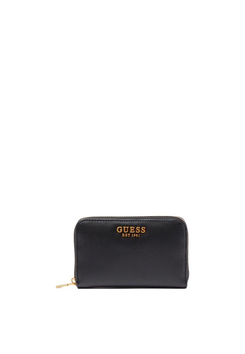 Portefeuille zippé en cuir noir avec le logo doré "GUESS EST 1981", de forme rectangulaire slim, texture lisse et détails cousus.