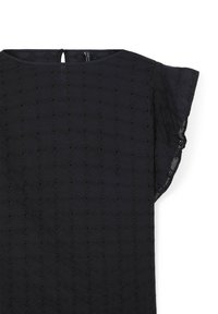 Top noir avec un motif en losanges ajourés, manches courtes à volants, et une fermeture au dos avec ouverture en goutte d'eau. Confectionné dans un tissu léger.