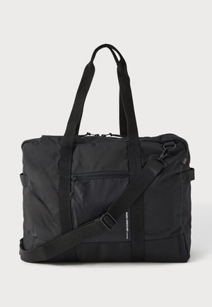 TIAN FLYAWAY BAG UNISEX - Kelioninis krepšys - black