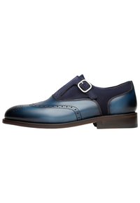 Navy Leder Oxford-Schuh mit einem Wildleder-Einsatz, dekorativen Perforationen und einer Metall-Schließe. Verfügt über eine runde Zehenpartie und einen gestapelten Absatz.