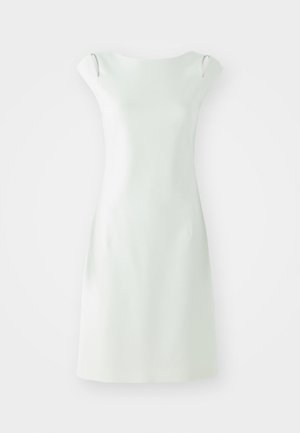 Trumpas baltas suknelė su paprasta siluetu, apvaliu iškirpimu ir trumpomis rankovėmis. Lygus paviršius, minimalistiškas dizainas, su šoninėmis išpjovomis.