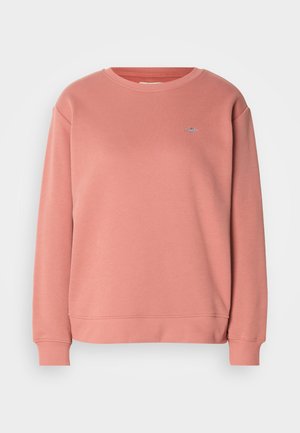 Długi rękaw, okrągły dekolt, bladoróżowy sweatshirt z prążkowanymi mankietami i dołem, z małym haftowanym logo na lewej piersi.
