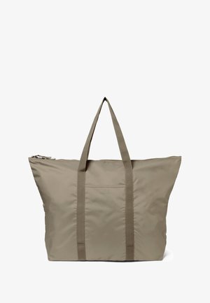 Light brown tote bag with two sturdy handles, featuring a front pocket and zipper closure. The brand name "DAY ET" is embossed on the front.