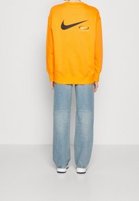 Nike Sportswear Mikina - orange