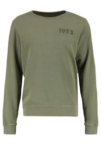 Olivgrön sweatshirt i bomull, långärmad, med ribbade muddar och nederkant. Utrustad med en texturerad 1973-emblem på bröstet.