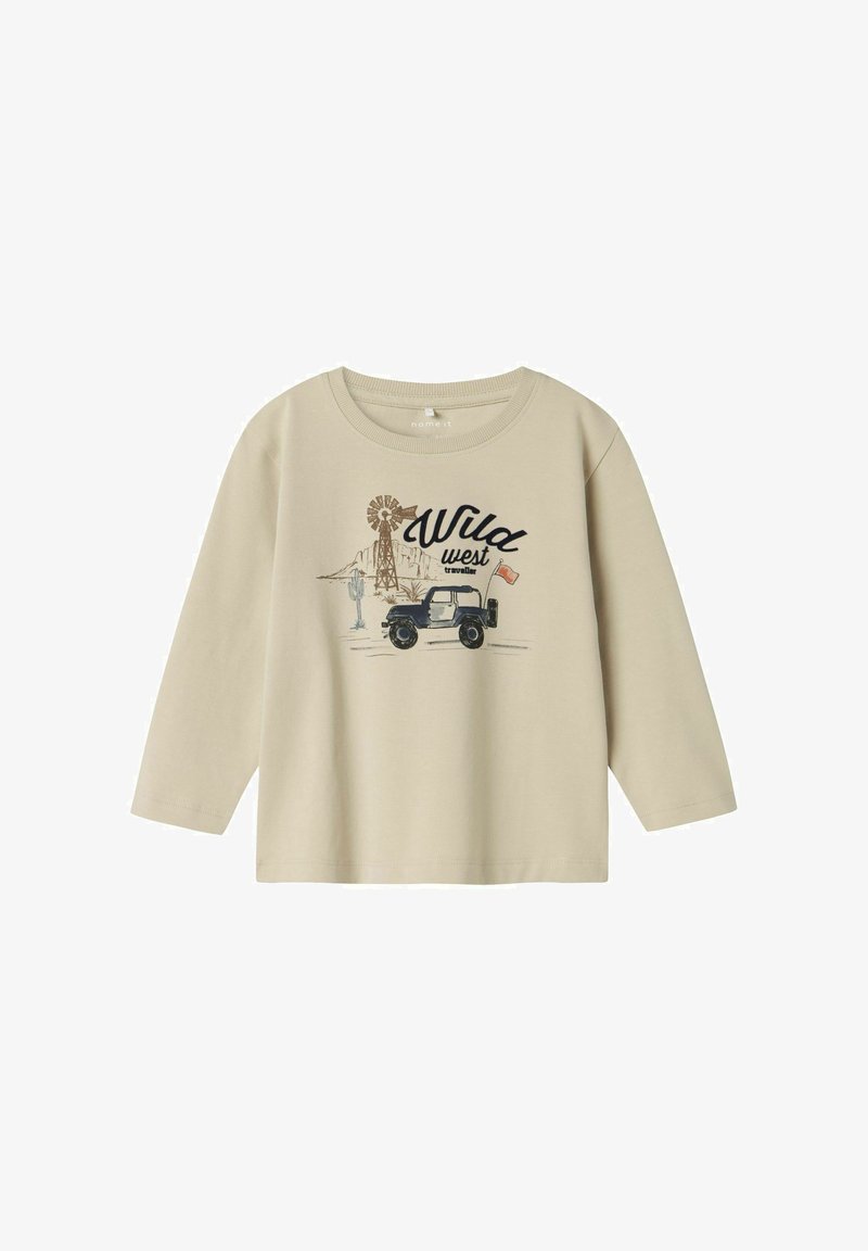 Beige pitkähihaisessa paidassa on edessä tuulivoimala, vuoria ja ajoneuvo, jossa on mustalla kirjoitettu "Wild West" -teksti. Materiaali on puuvillaa ja malli on rento.