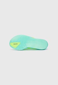 Light blue running shoe sole with a textured surface, featuring a yellow Continental logo and "ADIZERO" embossed on it.