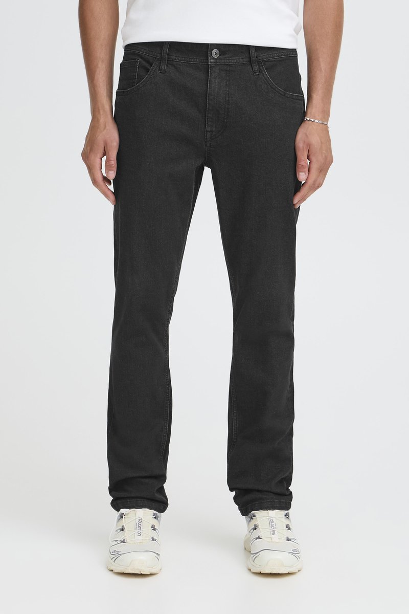Černé džíny z denimu s rovně střiženým střihem, pětikapsovým designem a zapínáním na knoflík. Texturovaná látka s hladkým povrchem.
