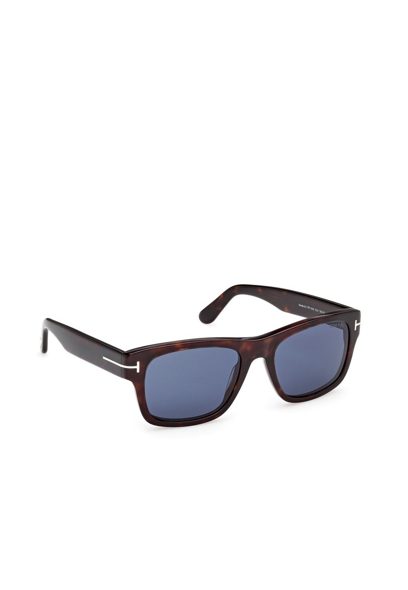 Sunglasses with dark blue lenses and a tortoiseshell acetate frame. Features sleek arms with silver accents on the sides.