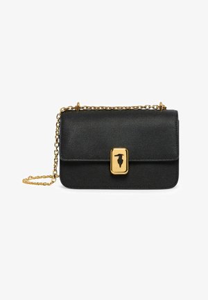 Black textured leather crossbody bag with gold chain strap and rectangular gold clasp featuring a black bird silhouette.