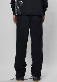 9N1M SENSE HERREN SENSE  - Joggebukse - black